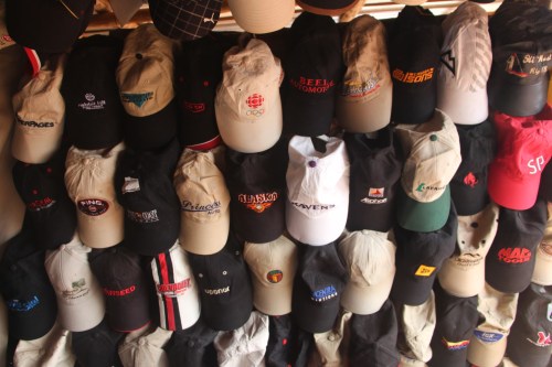 The CBC logo suggests this batch of caps in Makeni, Sierra Leone came from Canada.